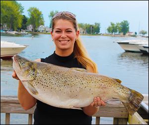 Keely Pinkelman of Toledo snagged a 17-pound, 8-ounce brown trout in late August. The Central Catholic and BGSU graduate’s entry took second place in the Lake Ontario Counties Derby.