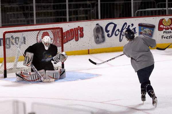 Walleye-13-Stephon-Thorne-shoots-a-puck-at-goalie-Neil-Conway