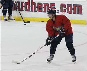 Travis Novak goes through a drill at training camp. The right wing had 11 goals and 23 assists last season when the Walleye finished 37-26-9 in the regular season for a franchise-best 83 points.