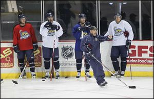 Nick Vitucci instructs his team at training camp at the Huntington Center. Vitucci enters his fifth season as Walleye coach. He was the Storm's coach for three and a half seasons.