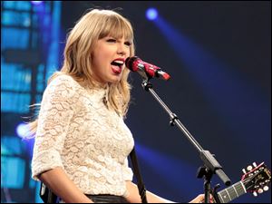 Taylor Swift, pictured, Jason Aldean and most of the major nominees will perform at the Country Music Association Awards next month. 