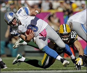 Green Bay's Clay Matthews sacks Matthew Stafford on Sunday in Green Bay. The Packers sacked Stafford five times, matching the most times he's been sacked in a game.
