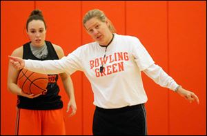 Jennifer Roos, head women’s basketball coach, at practice at the Stroh Center on Tuesday, says summer practice helped get her team up to speed faster.
