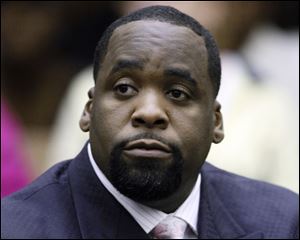 Former Detroit Mayor Kwame Kilpatrick sits at his sentencing in Wayne County Circuit Court on an obstruction-of-justice conviction in May, 2010.