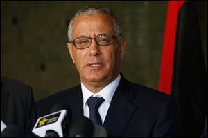 Libyan's Prime Minister Ali Zeidan speaks to the media during a press conference in Rabat, Morocco, Tuesday, Oct. 8, 2013. Zeidan was kidnapped early Thursday morning, EST.