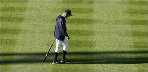Tigers manager Jim Leyland walks across the outfield on Monday. Leyland admits to letting Game 2 get away from Detroit after a grand slam in the eighth and a game-winning single in the ninth.