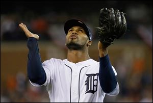 Detroit Tigers' Al Alburquerque looks up at the end of top of the ninth inning.