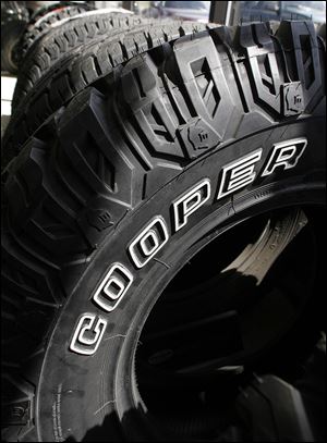 Apollo Tyres claims Cooper Tire & Rubber Co. is pressuring union officials to wring more concessions from the Indian firm. Cooper accuses Apollo of delaying reaching a deal with the United Steelworkers. The two firms have taken to the courts in an attempt to blame each other for the delays.