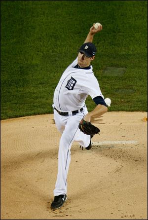 Detroit Tigers starting pitcher Doug Fister throws in the first inning during.