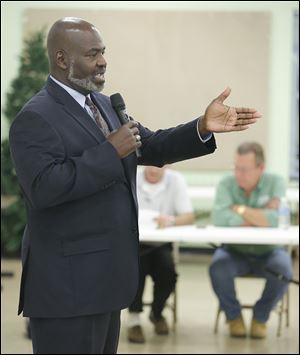 Mayor Mike Bell answers a question during the Point Place Business Association's Annual Meet the Candidates Forum on Wednesdayat the  Friendship Park Community Center in Point Place.