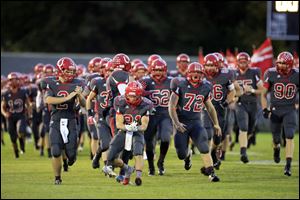 The Mules take the field to play Monroe High School on Friday night at Bedford High School.