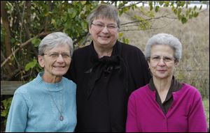 Peace activists from left to right Sister Paulette Schroeder,  Jo Hollingsworth, and Anne Abowd Tuesday, Oct. 15, 2013, in Bowling Green.