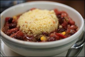 Red and black bean chili con couscous.