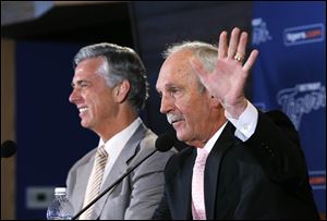 Detroit Tigers manager Jim Leyland waves while announcing he is stepping down as manager during a news conference at Comerica Park in Detroit, Monday.