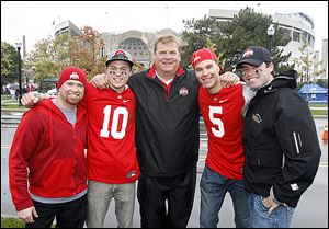 Don Mewhort, center, father of Ohio State lineman Jack Mewhort, is flanked by his Canadian fishing guides, from left, Collin Reddekopp, Scott Tomkins, Nigel Daigneault, and Greg Sproat at Ohio Stadium. The guides traveled two days from Saskatoon.