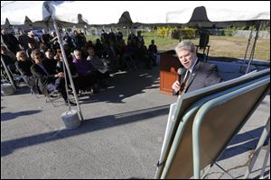 David J. Livingston, president of Lourdes University, explains project plans during a ceremony at the corner of Brint and McCord roads. 