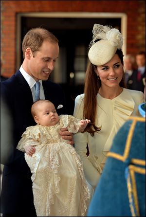 Britain's Prince William, Catherine, Duchess of Cambridge, with their son Prince George arrive at Chapel Royal in St James's Palace in London, for the christening of the three month-old prince.