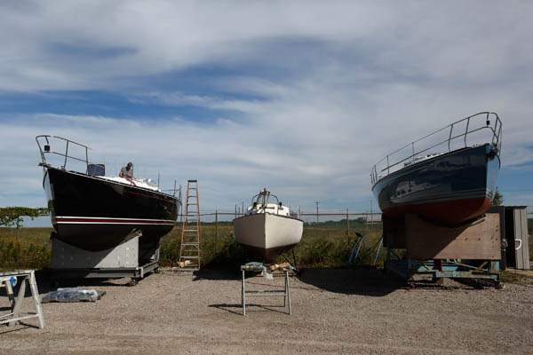 Three-custom-built-yachts-sit-in-dry-dock-at-Hanover-Marine-in-Fairport-Harbor