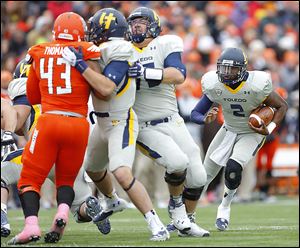 Toledo's Terrance Owens finds some running room against Bowling Green. The senior quarterback has thrown game-winning touchdowns in the past two games.