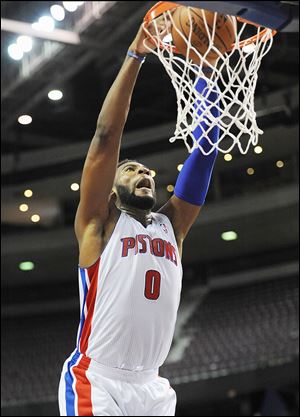 Detroit Pistons center Andre Drummond (0) dunks for two of his team high 17 points against Maccabi Haifa during the third quarter of an NBA preseason basketball game.