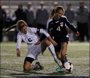Anthony Wayne's Chloe Brown and Notre Dame's Julia Spencer vie for the ball.