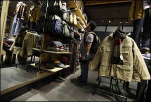 A shopper browses at a Timberland store in Skokie, Ill., earlier this month.
