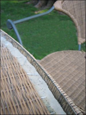 Freeze-thaw cycles damage patio furniture like this faux-rattan set when left outside unprotected.