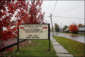 A sign outside the Jackson Township-Hoytville Fire Department encourages residents to support a two-year .75-mill levy for the department’s operation.