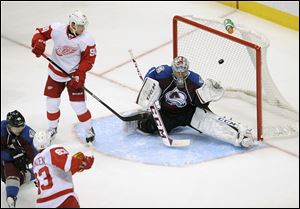 Colorado Avalanche goalie Semyon Varlamov lets in a goal by Red Wings' Johan Franzen in a  game on Oct. 17 in Denver.