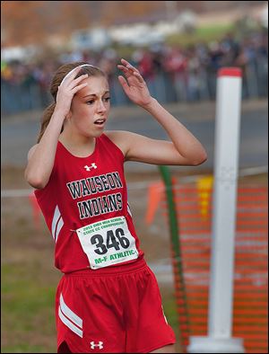 Wauseon’s Taylor Vernot reacts after winning the Division II cross country championship in a time of 18:04.4 on Saturday at National Trail Raceway.