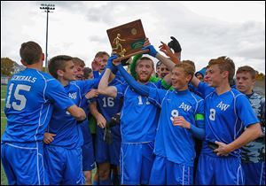 Anthony Wayne celebrates its Division I regional soccer championship. The Generals are 17-0-4.