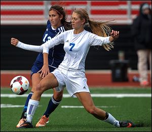 Anthony Wayne's Anna Glanz, right, steals the ball from Rocky River Magnificat's Alyssa Baumbick.