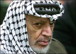 2002 file photo of Palestinian leader Yasser Arafat.