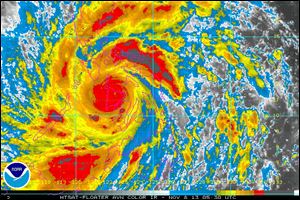 In this image provided by NOAA today which was taken at 12:30 a.m. EST shows Typhoon Haiyan as it crosses the Philippines. 