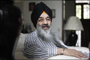 Kuldeep Singh,  pictured at his home, is a board member of the Council for a Parliament of the World's Religions.