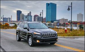 Instead of rewarming the design of the Jeep Liberty, Chrysler designed the Cherokee from scratch, resulting in a more refined vehicle.