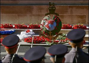 Wreaths lie on the Cenotaph during the service in London. The service is on the 11th hour on the nearest Sunday to Nov. 11, when World War I ended in 1918.