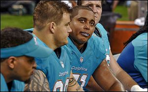 The relationship between Dolphins guard Richie Incognito, left, and tackle Jonathan Martin is part of an NFL investigation.
