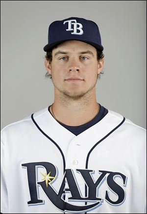 FIe - This is a 2013 file photo showing Tampa Bay Rays baseball player Wil Myers. Wil Myers of the Tampa Bay Rays has won the AL Rookie of the Year award after putting up impressive offensive numbers in barely half a season. The right fielder received 23 of 30 first-place votes from the Baseball Writers' Association of America in results announced Monday, Nov. 11, 2013 beating out Detroit shortstop Jose Iglesias and Rays teammate Chris Archer. (AP Photo/David Goldman, File)