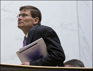 Then-acting CIA Director Michael Morell walks in the hallway of the Capitol Hill in Washington in November, 2012.