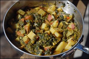 Curried Spinach and Red Potatoes is a quick and easy curry that stands on its own. It can also be served over jasmine rice or with your favorite protein. 