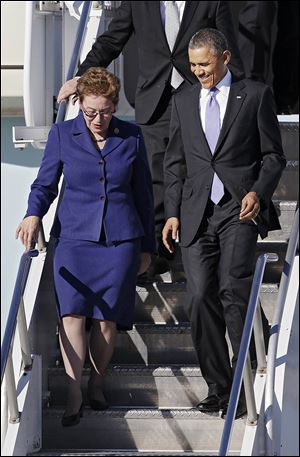 President Obama and U.S. Rep. Marcy Kaptur (D., Toledo) exit Air Force One at Cleveland Hopkins. Mr. Obama spoke at a steel mill along the Cuyahoga.
