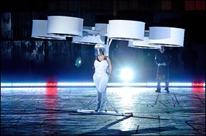 Lady Gaga demonstrates the Volantis transport prototype ‘flying dress’ designed by TechHaus - Studio XO during the ‘Artpop’ album release and artRave event in New York.