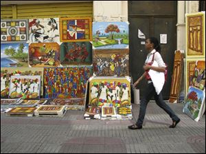 Calle El Conde is a pedestrian walkway where seemingly everything is for sale, including art, in Santo Domingo, Dominican Republic.