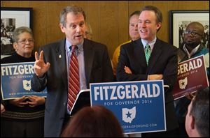 U.S. Senator Sherrod Brown, left, D-Ohio,  endorses Ed FitzGerald, Cuyahoga County Executive and Democratic candidate for Governor, right, during an appearance today at Michael's Restaurant in Toledo.