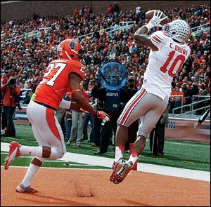 Ohio State wide receiver Corey Brown makes a touchdown catch against Eaton Spence of Illinois.