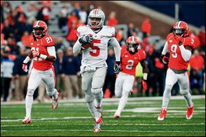 Ohio State quarterback Braxton Miller runs for a 70-yard touchdown against Illinois. He rushed for 184 yards on 16 carries and threw for two touchdowns.