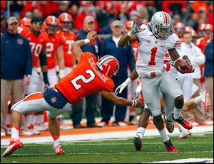 Ohio State cornerback Bradley Roby (1) avoids Illinois quarterback Nathan Scheelhaase (2) as he returns an interception a 63-yards for a touchdown.