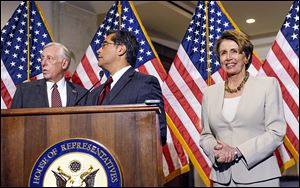 House Minority Leader Nancy Pelosi of California, seen with House Minority Whip Steny Hoyer of Maryland, left, and Rep. Xavier Becerra (D., Calif.), says her party’s support for the health-care law remains solid.