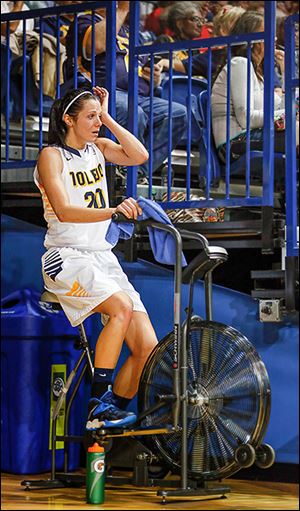 UT’s Stephanie Recker pedals  to stay loose. She was injured on a hard play early in the first half.
